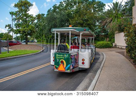 Florida. July 12, 2019 Trams Used To Transport Visitors Between The Parking Lot And The Entrance (2)