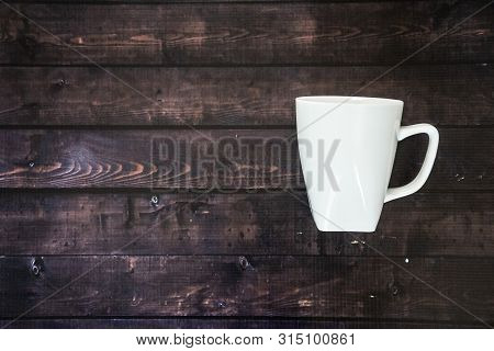 Single Coffee Mug On A Wooden Table Background - Java Espresso With Copy Space