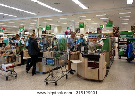 Vero Beach, Fl/usa - 8/2/19 - The Check Out Counter At The Grocery Store With Employees Checking Out