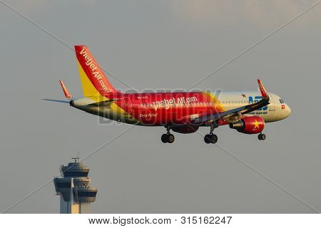 Airplane Landing At Saigon Airport, Vietnam