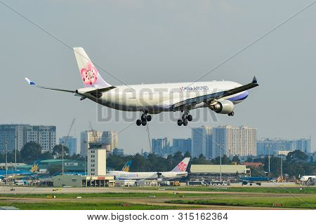 Airplane Landing At Saigon Airport, Vietnam