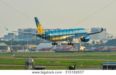 Airplane Landing At Saigon Airport, Vietnam