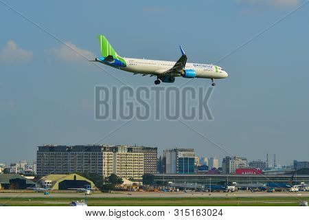 Airplane Landing At Saigon Airport, Vietnam