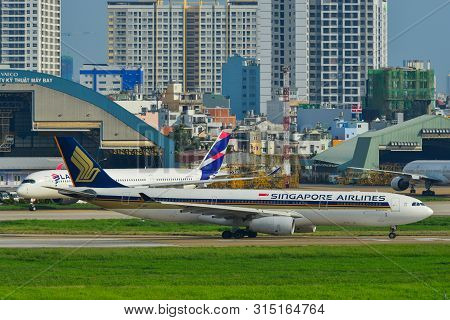 Saigon, Vietnam - Jul 10, 2019. Singapore Airlines 9v-ssc (airbus A330-300) Taxiing On Runway Of Tan