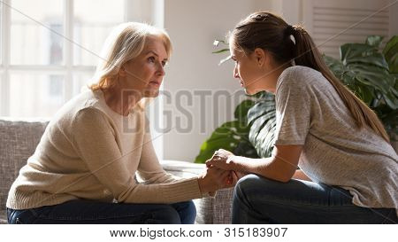 Different Generations Women Talking Holding Hands Giving Psychological Support