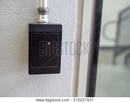 Black Electronic Keycard Reader Scanner Out Side Of Building Entrance