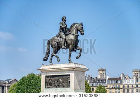 Paris, France, April 30, 2019: Equestrian Statue Of Henry Iv By Pont Neuf - Paris, France