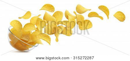 Potato Chips Falling Into Glass Bowl Isolated On White Background