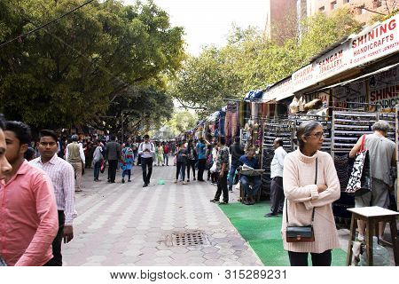 Indian People And Foreigner Travelers Walking Travel Visit And Shopping Product At Janpath And Tibet