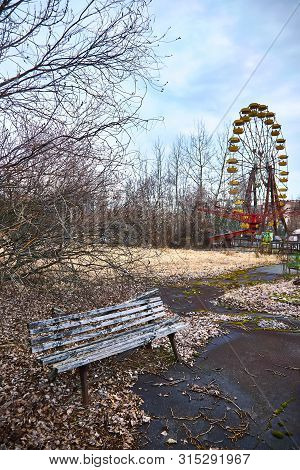 Old Ferris Wheel In The Ghost Town Of Pripyat. Consequences Of The Accident At The Chernobil Nuclear