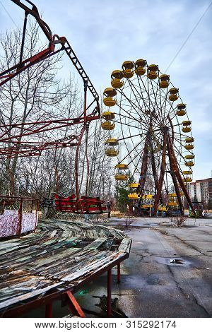 Old Ferris Wheel In The Ghost Town Of Pripyat. Consequences Of The Accident At The Chernobil Nuclear
