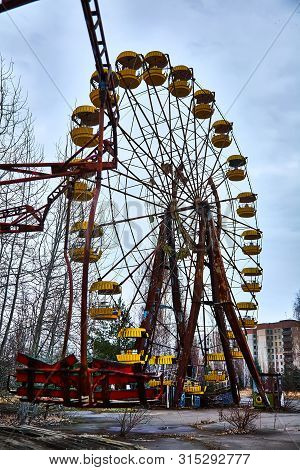 Old Ferris Wheel In The Ghost Town Of Pripyat. Consequences Of The Accident At The Chernobil Nuclear