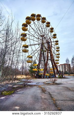 Old Ferris Wheel In The Ghost Town Of Pripyat. Consequences Of The Accident At The Chernobil Nuclear