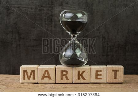 Time Countdown For Stock Market, Fluctuation On Market, Hourglass Or Sandglass On Wooden Cube Block 