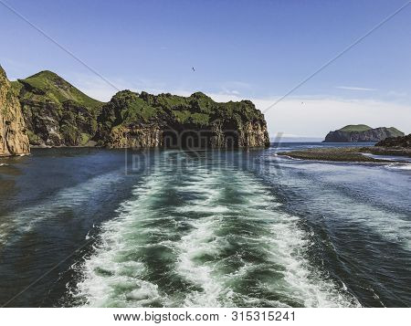 View Of Volcanic Cliffs And Islands In Vestmanneyjar (westman Islands) Harbor In South Iceland, Seen