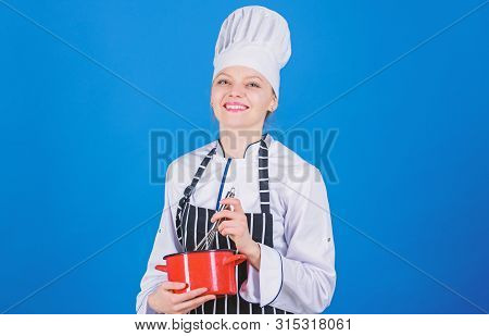 Woman Professional Chef Hold Whisk And Pot. Whipping Like Pro. Girl In Apron Whipping Eggs Or Cream.