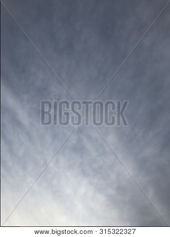 Beautiful Sky Painted By The Sun Leaving Bright Golden Shades.dense Clouds In Twilight Sky In Evenin