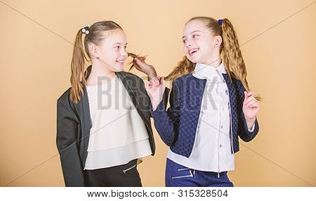 Girls Enjoy Having Long Hair. Hairstyle For Female. Cheerful Friends Made Same Hairstyle For Fun. We