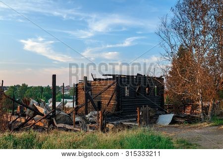 Log Residential House After The Fire. Village Of Visim, Sverdlovsk Region, Urals, Russia.