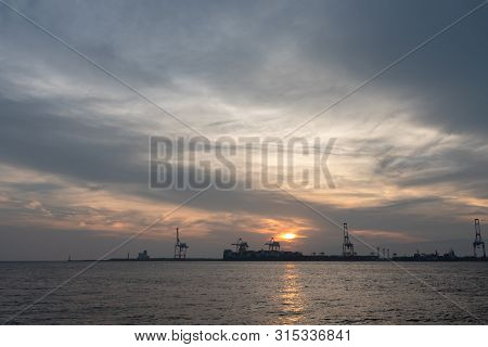 Osaka Bay With Yumeshima Island On Background In Summer Sun Set Time, View From Osaka Metro Cosmosqu