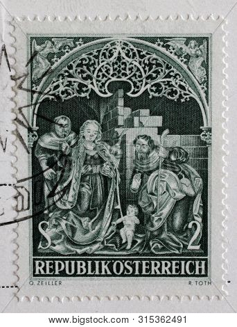 ZAGREB, CROATIA - SEPTEMBER 11, 2014: A stamp issued in the Austria shows Adoration of Shepherds in Johannes Chapel, Nonnberg Abbey, Christmas serie, circa 1967.