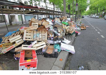 Paris France - May 25, 2019: Rubbish Piled Up After Weekend Street Market In Paris France