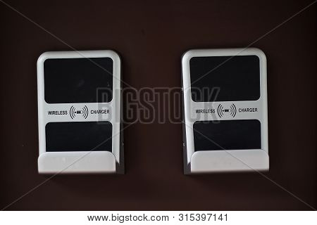 Two Phone Wireless Pads At Bus Station