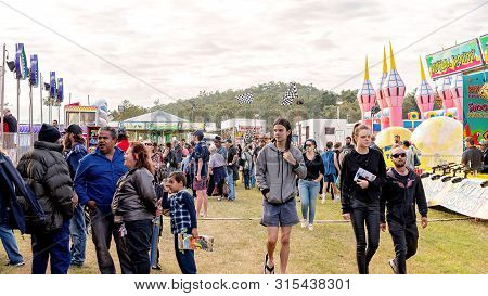 Sarina, Queensland, Australia - August 2019: Crowds Enjoying Sideshow Alley At Local Country Show