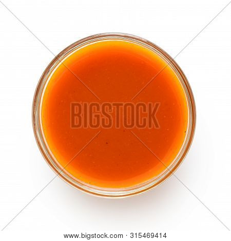Peri Peri Chilli Sauce In A Glass Bowl Isolated On White From Above.