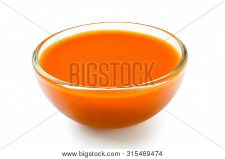 Peri Peri Chilli Sauce In A Glass Bowl Isolated On White.