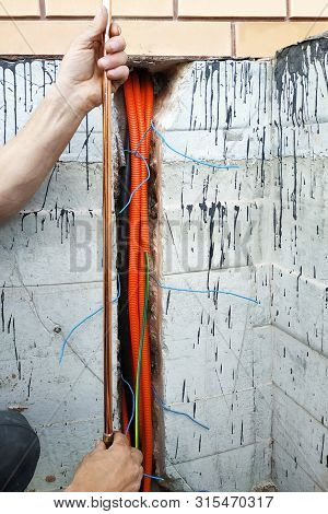Connection Of A Copper Tube For Grounding Of The Electric Shock-proof Device In An Apartment House.