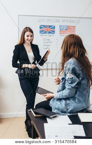 Learning English Language, Female Teacher Near Whiteboard Giving Lesson
