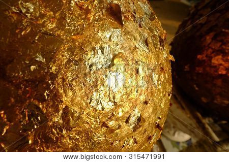 Gilding Gold Leaf On Big Boundary Stone Blessing In Bhuddism Religion
