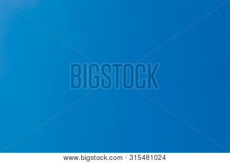 Clear Blue Sky Without Clouds. Texture Photo.