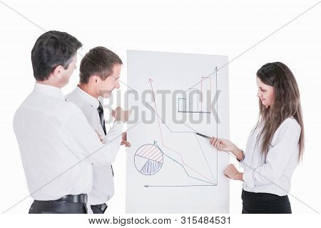 Group Of Successful Businessmen. Discussion  Charts And Grap