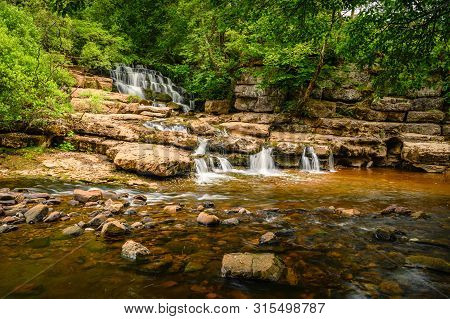 Lower East Gill Force Entering River Swale, Is A Waterfall Situated At The Foot Of East Gill Near Ke