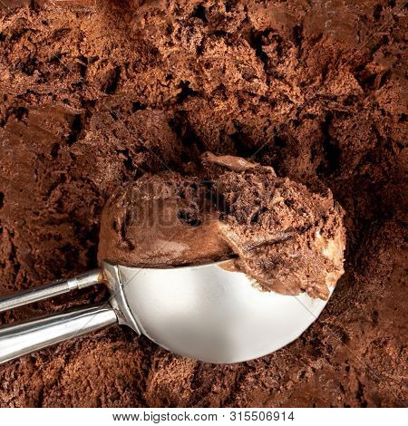 Chocolate  Ice Cream Scoop.  Dark Cocoa Ice-cream Background Or Texture. Top View