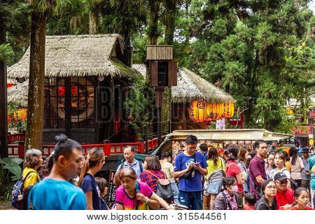 Travelers At Xitou Monster Village