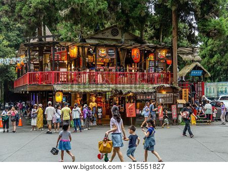 Travelers At Xitou Monster Village