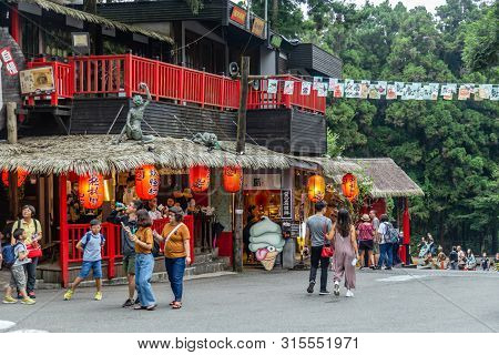 Travelers At Xitou Monster Village