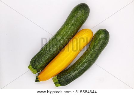 Zucchini Isolated On White Background. Fresh Organic Vegetarian Courgette Plant. Marrow Squash Raw A