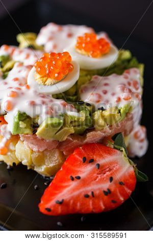 Round Salad Made Of Red Fish Potato And Avocado