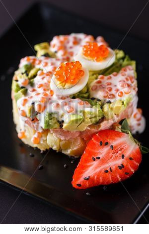 Round Salad Made Of Red Fish Potato And Avocado