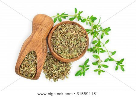 Dried Thyme Leaves In The Wooden Bowl And Scoop, With Fresh Thyme Isolated On White Background. Top 