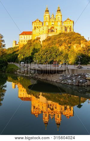 Melk Abbey, German: Stift Melk, Reflected In The Water Of Danube River, Wachau Valley, Austria