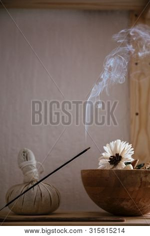Aroma Stick, Smoke And Flower Are On The Table Concept Of Peace And Relax