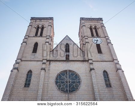 Eglise Saint Jean Baptiste Church At Dusk In Bourgoin Jallieu, France, A City Of Dauphine Region, In