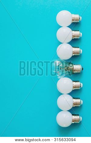 Lamps, Led Lamps And Fluorescent Lamps On Blue Background. Large Set Of Led Bulbs. White Energy-savi