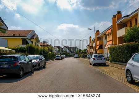 Rovigo, Italy - July, 7, 2019: cars parked on the street in Rovigo, Italy