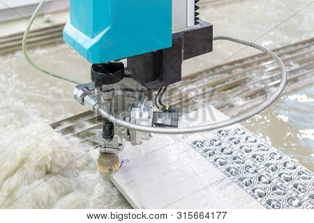 Close Up Nozzle Of High Speed And Precision Automatic Computer Control High Pressure Water Jet Cutti